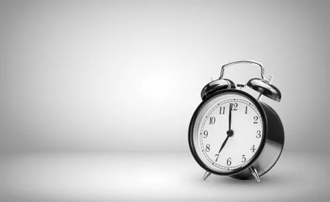 Alarm clock on gray background Stock Photos