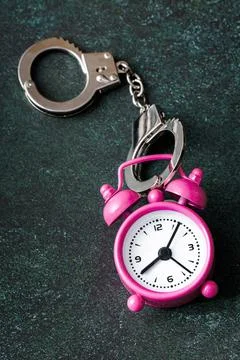 The alarm clock is handcuffed 写真素材