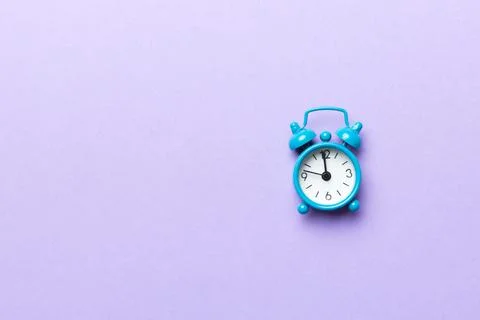 Alarm clock isolated on colored background with copy space top view 스톡 사진