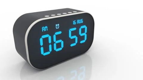 Alarm clock isolated on white background rings at 7 am when the morning comes Stock Footage 135867881