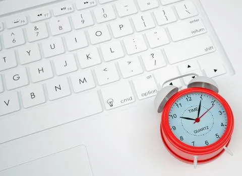 Alarm clock on the keyboard Illustrazione stock