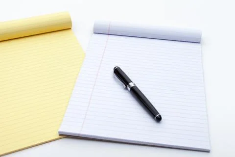 Alarm clock, notes and pen Stock Photos