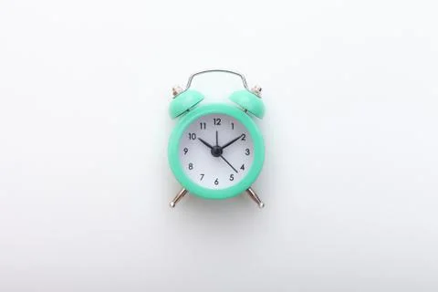 Alarm clock, notes and pen Stock Photos