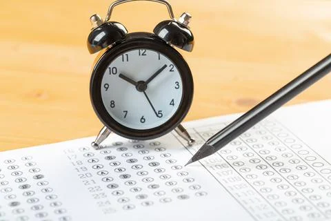 Alarm clock, optical form of standardized school test with bubble and black p Stock Photos