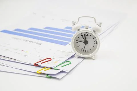 Alarm clock papers with clips. High quality photo Stock Photos