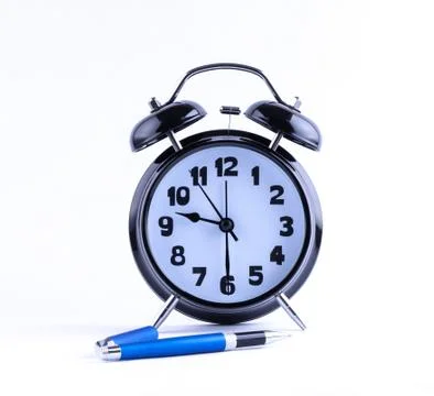 Alarm clock with pen 写真素材