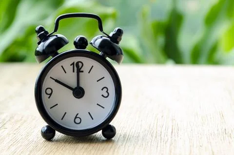 Alarm clock pointing at 10 pm with customizable background space for text o.. Stock Photos