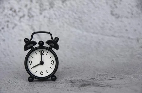 Alarm clock pointing at 8 o'clock with customizable space for ideas or text. Stock Photos
