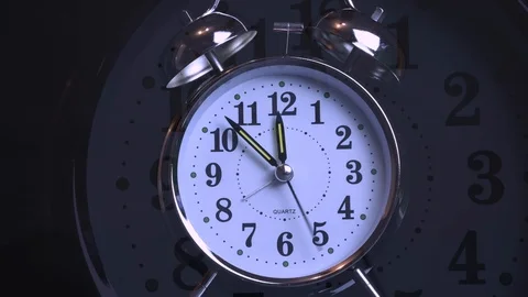 Alarm clock quickly turns clock Stock Footage 119369691