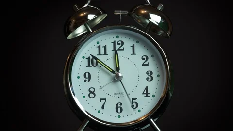 Alarm clock quickly turns clock Stock Footage 119372425