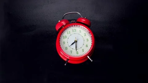 Alarm clock ringing on the table. stop motion Stock Footage 140260972
