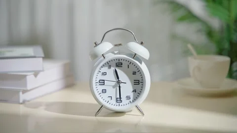 The alarm clock rings at 11:30 a.m Video stock 247248108