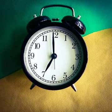 An alarm clock showing a time Stock Photos