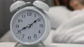 Alarm clock sound waking up male sleeping in bed, self-discipline and morning HD Footage