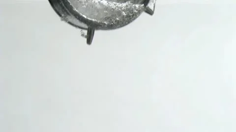 Alarm clock in super slow motion falling in the water 스톡 동영상 10860690