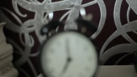 Alarm clock on the table. Stock Footage 77580085