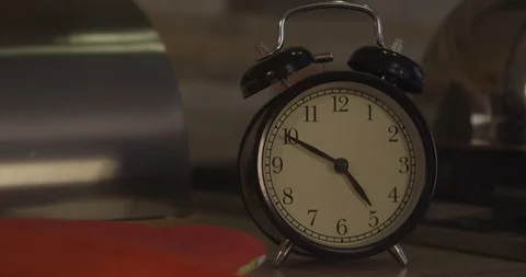 Alarm clock on the table Stock Footage 122270788