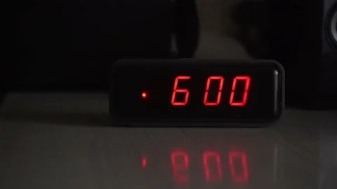 The alarm clock on the table rings at 6 o'clock in the morning Stock Footage 164033871