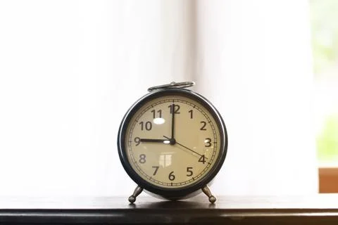 Alarm clock on the table in the room, Stock Photos