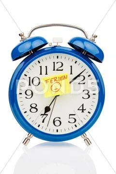 Alarm clock on vacation beginning Stock Photos