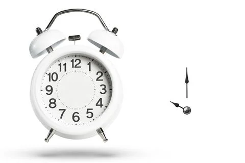 Alarm clock without arrows. White classic alarm clock on a white background 库存照片