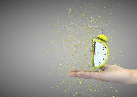 Alarm clock yellow on a gray background explodes in the girl's hands Illustrazione stock