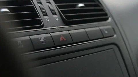 Alarm lights button inside the car Stock Footage 65437521