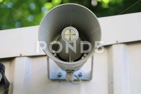 Alarm siren on the wall Stock Photos