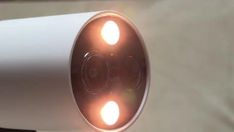 Alarming Vigilance: Security Camera Flashes Bright Lights and Blasts Siren Sound Stock Footage 328797789