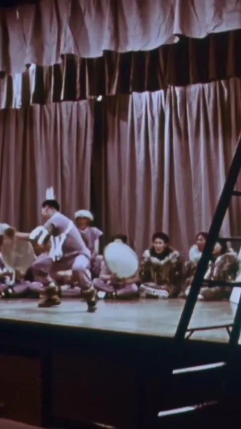 ALASKA - 1960 - Indigenous Alaskans begin a drumming and dancing rehearsal. Stock Footage 339489168