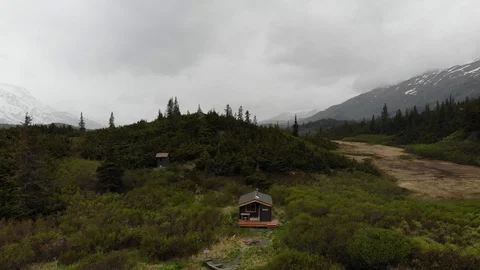 Alaska Cabin in the Mountains Aerial Stock Footage
