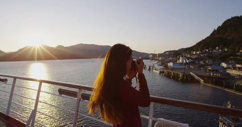 Alaska Cruise ship passenger photographing city of Ketchikan in Inside Passage Stock Footage