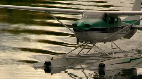Alaskan float plane docking with pilot stepping out Stock Footage 40448419
