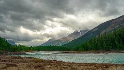 Alaskan Mountain Range With Glacier Run Off River Driftwood Pan IN Time Lapse Stock Footage 132467862