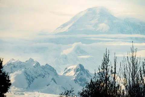 Alaskan Peaks Emerging from Clouds II 写真素材