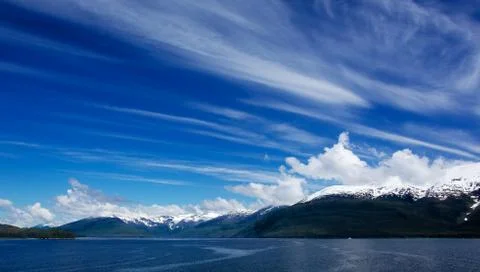 Alaskan sky clouds left to right Stock Photos