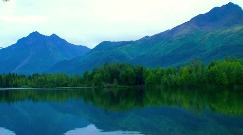 Alaska's reflection lake summer with a tilt pan Stock Footage 40452907