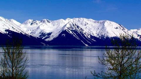 Alaska's turn-again arm with snow capped mountain as a back drop Stock Footage 40465550