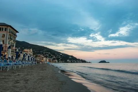 Alassio beach on sunset Stock Photos