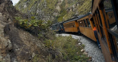 Alausi, Ecuador - March 3 2018: Dutch angle of train in Andes mountains Stock Footage 87215554