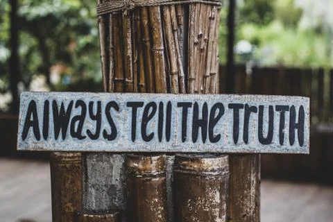 Alawyas tell the truth on wooden panel Stock Photos