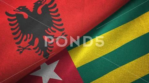 Albania and Togo two flags textile cloth, fabric texture Stock Photos