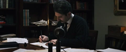Albert Einstein writing at desk - Reenactment Stock-Footage 202906576