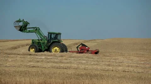 Alberta canada - august 18, 2012 harvesting wheat Stockbeeldmateriaal 11824437