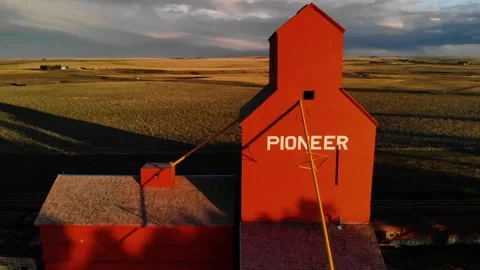 Alberta, Prairies -: Pioneer grain elevator in golden sunset . Stock Footage 170749417