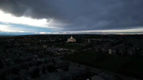 Alberta Temple Evening Dark Clouds aerial static Stock Footage 219767923