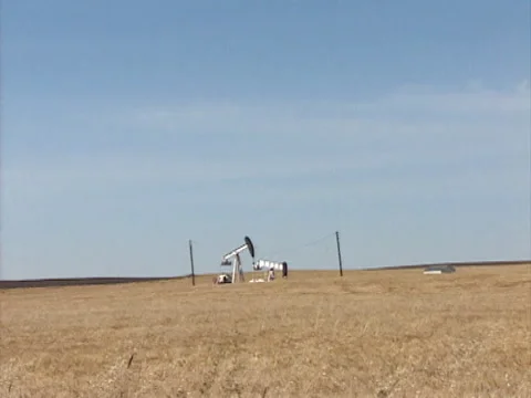 Alberta two oil wells long field Stock Footage 142198018