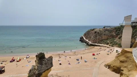Albufeira beach with cliffs and ocean Stock Photos