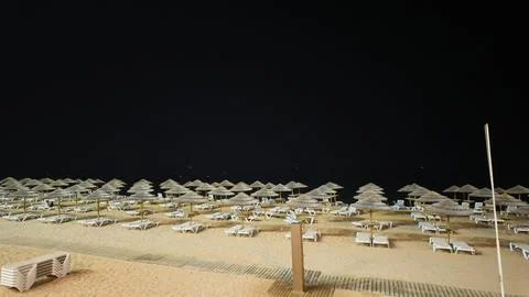 Albufeira beach at night time Stock Photos