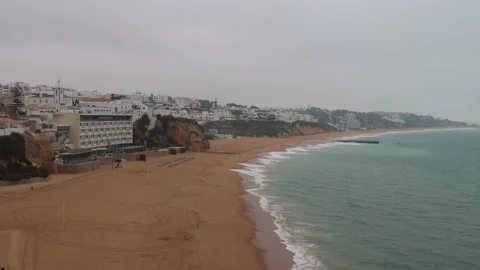 Albufeira, Portugal - December 27 2021 " Albuferia beach in the winter mornin Stock Footage 168084853